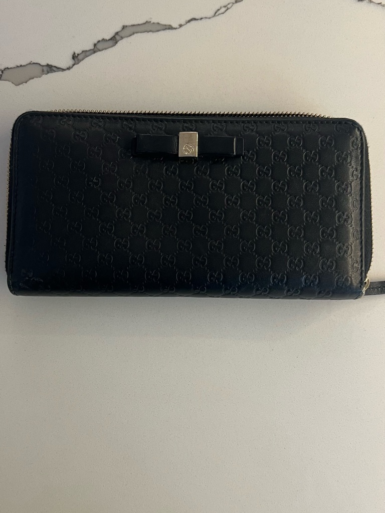 Gucci Black Embossed Gg Zip Wallet With Bow Detail